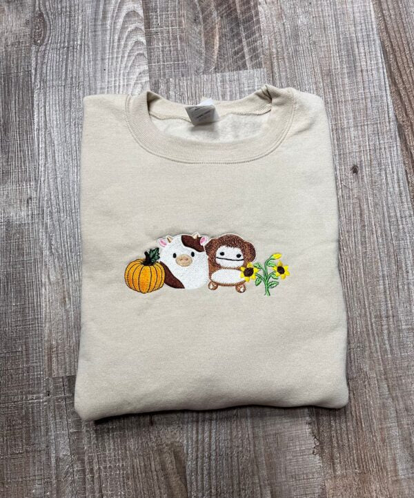 https://bekindproduct.com/cdn/shop/files/vintage-embroidered-sweatshirt-inspired-thanksgiving-fall_1664761871-600x721_1024x1024.jpg?v=1695569104